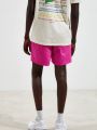  מכנסי ניילון קצרים בצבע ניאון UO של URBAN OUTFITTERS