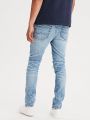  ג'ינס סלים אסיד ווש עם קרעים Airflex Slim של AMERICAN EAGLE