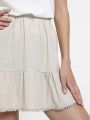  חצאית מיני פפלום עם עיטורי פונפונים של YANGA