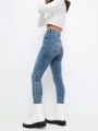  ג'ינס ווש בגזרה גבוהה Curvy Jegging של AMERICAN EAGLE