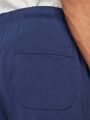  מכנסי טרנינג עם רקמת לוגו של NIKE