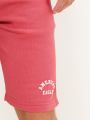  מכנסי טרנינג קצרים עם לוגו של AMERICAN EAGLE