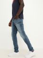  ג'ינס סקיני בשילוב שפשופים של TOMMY HILFIGER