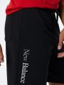  מכנסי טרנינג עם הדפס לוגו / גברים של NEW BALANCE