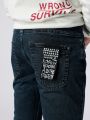  ג'ינס Slim ארוך עם פאץ' לוגו של KSUBI