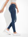  ג'ינס סקיני קרעים Hi-Rise Jegging של AMERICAN EAGLE