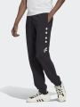 מכנסי טרנינג ארוכים עם לוגו של ADIDAS Originals