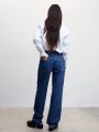  מכנסי ג'ינס מתרחבים של MANGO