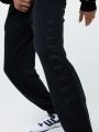  מכנסי טרנינג עם לוגו של BILLABONG