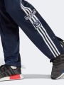 מכנסי טרנינג עם הדפס לוגו של ADIDAS Originals