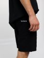  מכנסי ברמודה עם לוגו רקום של TAIKAN