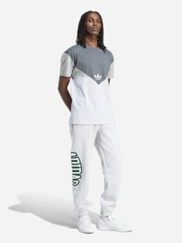 מכנסי טרנינג עם הדפס לוגו של ADIDAS Originals