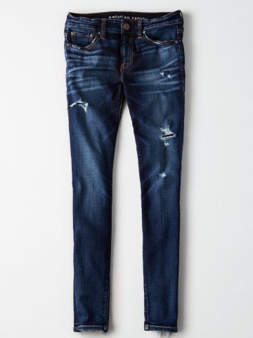 ג'ינס סקיני קרעים עם סיומת פרומה / נשים