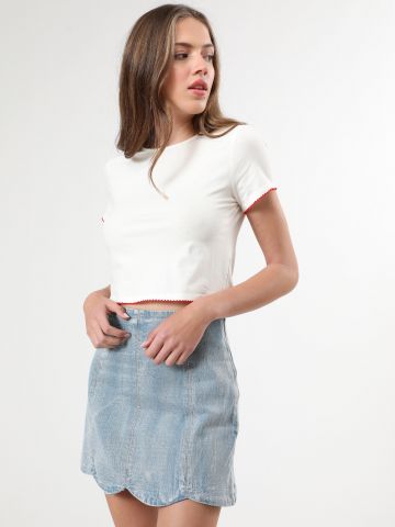 חצאית ג'ינס מיני ווש עם סיומת גלית