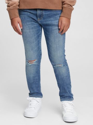 מכנסי ג'ינס סקיני עם קרעים של GAP