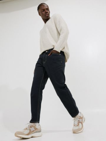 מכנסי ג'ינס עם תיפורים מודגשים של TERMINAL X