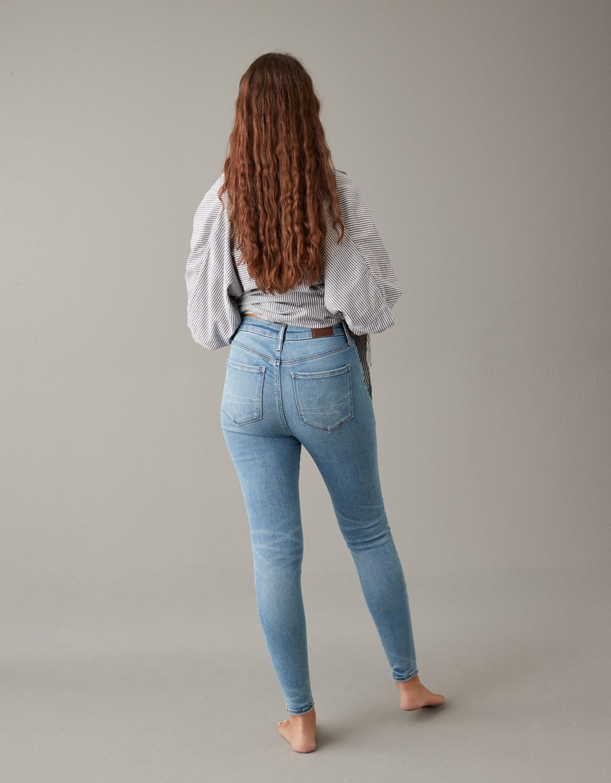  מכנסי ג'ינס SELF SIZE SUPER HIGH-RISE JEGGING של AMERICAN EAGLE