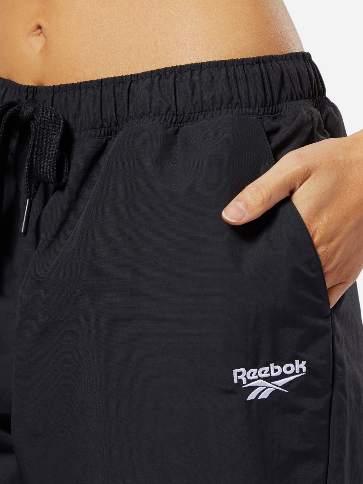  מכנסי ניילון ארוכים עם לוגו של REEBOK