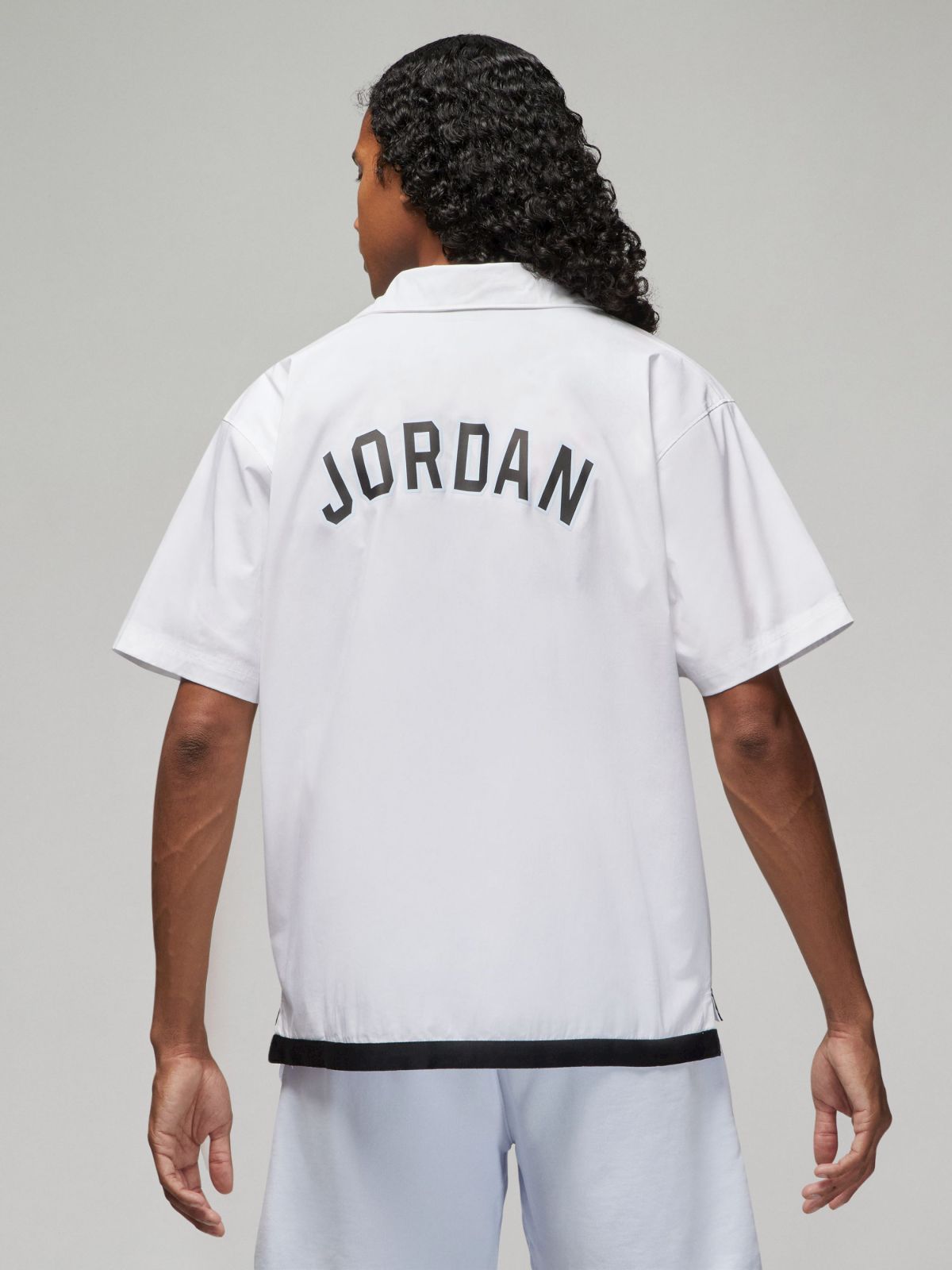  חולצת ג'ורדן מכופתרת Jordan Sport DNA של JORDAN
