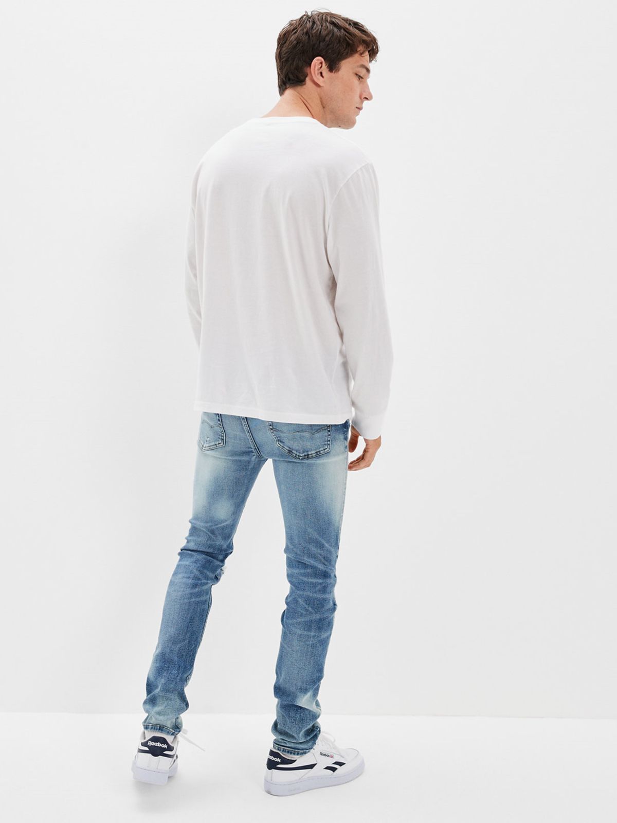  ג'ינס עם קרעים Medium bleached של AMERICAN EAGLE