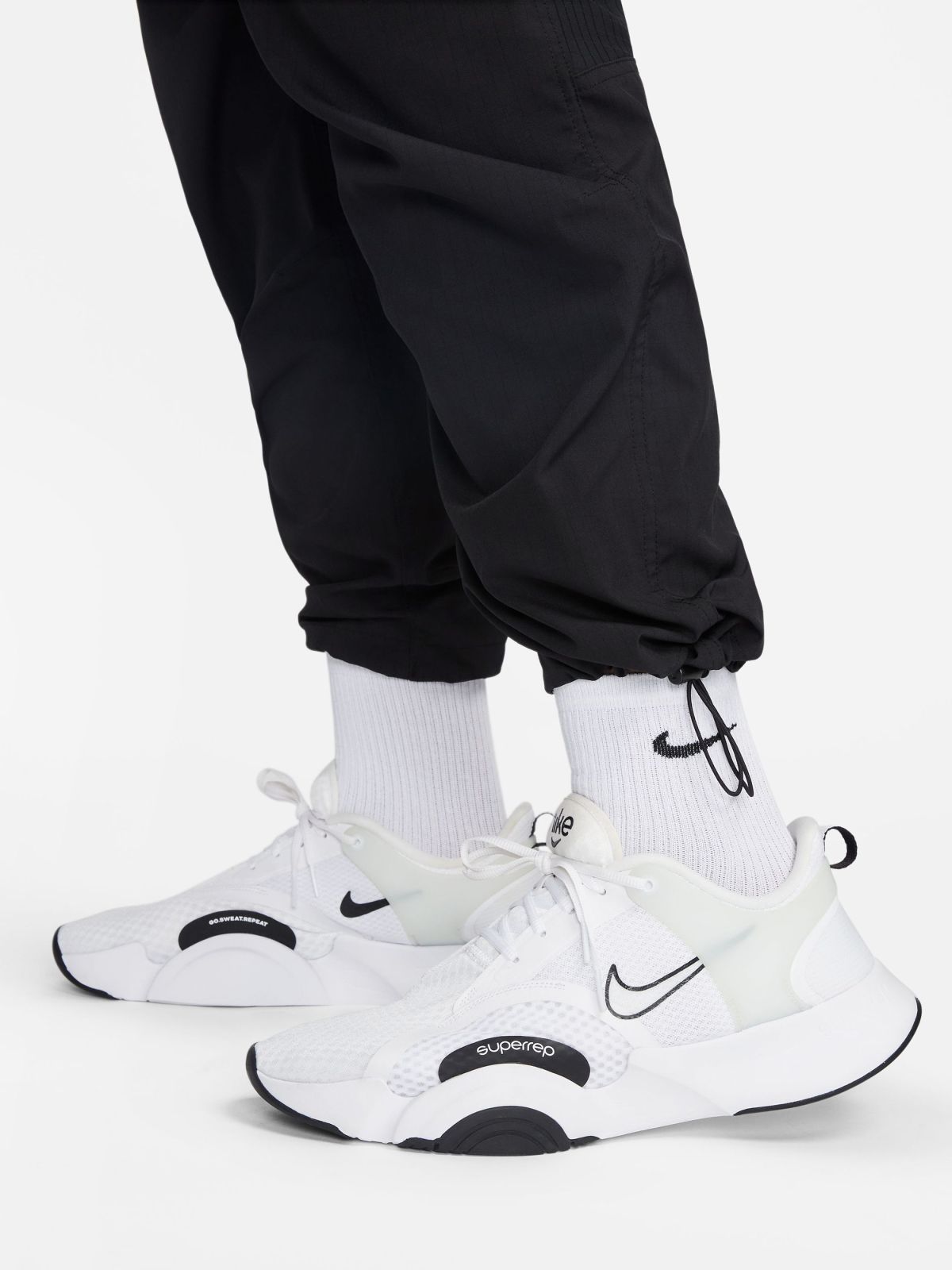  מכנסי אימון ארוכים Nike Dri-FIT ADV A.P.S של NIKE