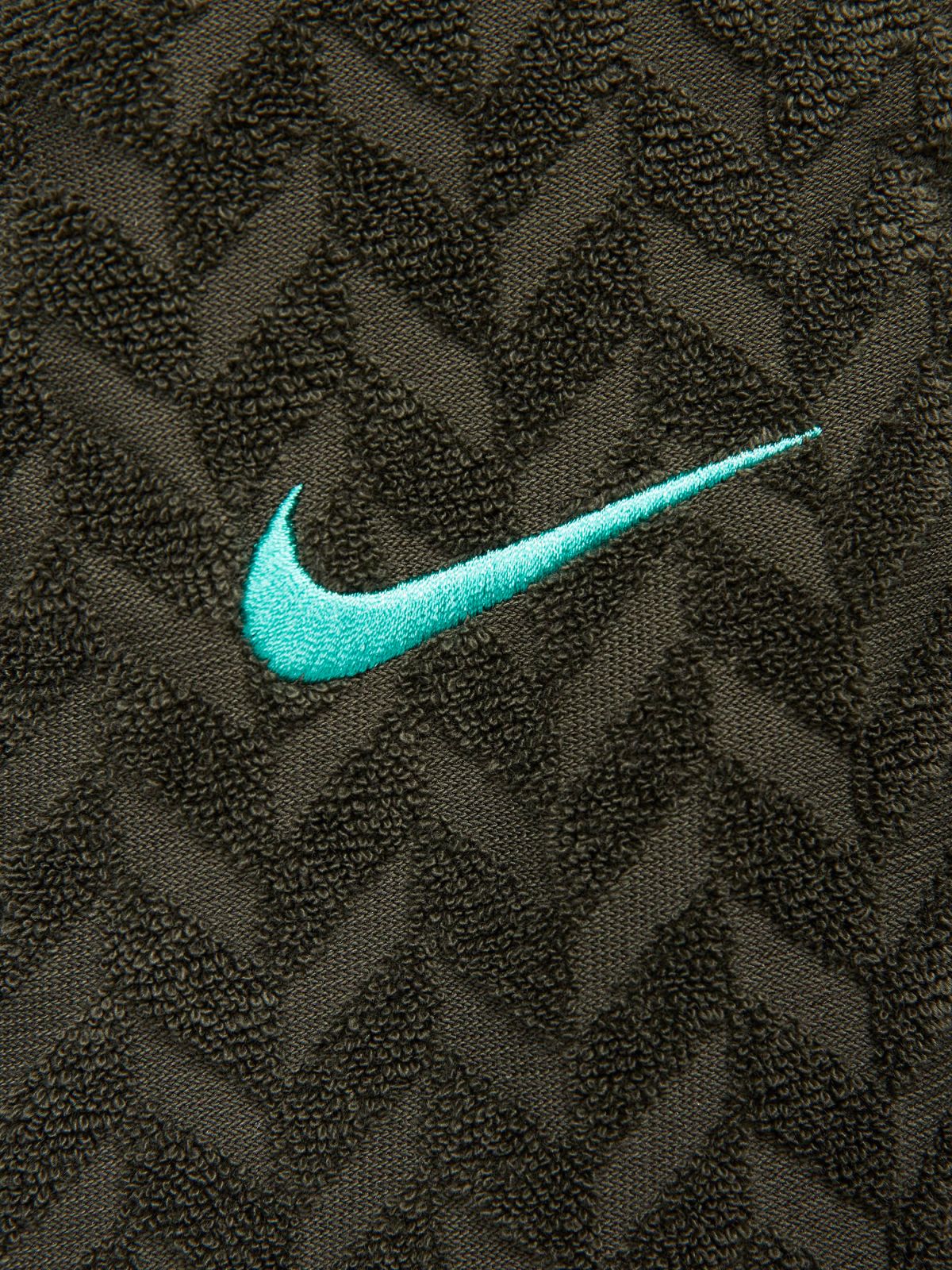  מכנסי טרנינג בטקסטורה Nike Sportswear Everyday Modern של NIKE