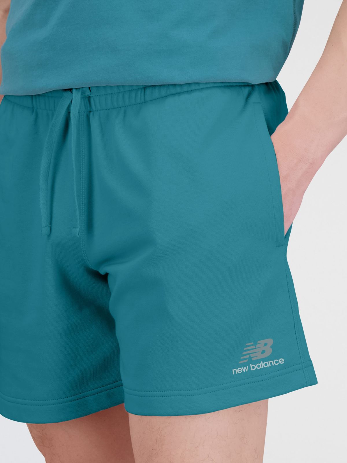  מכנסי טרנינג קצרים עם לוגו של NEW BALANCE